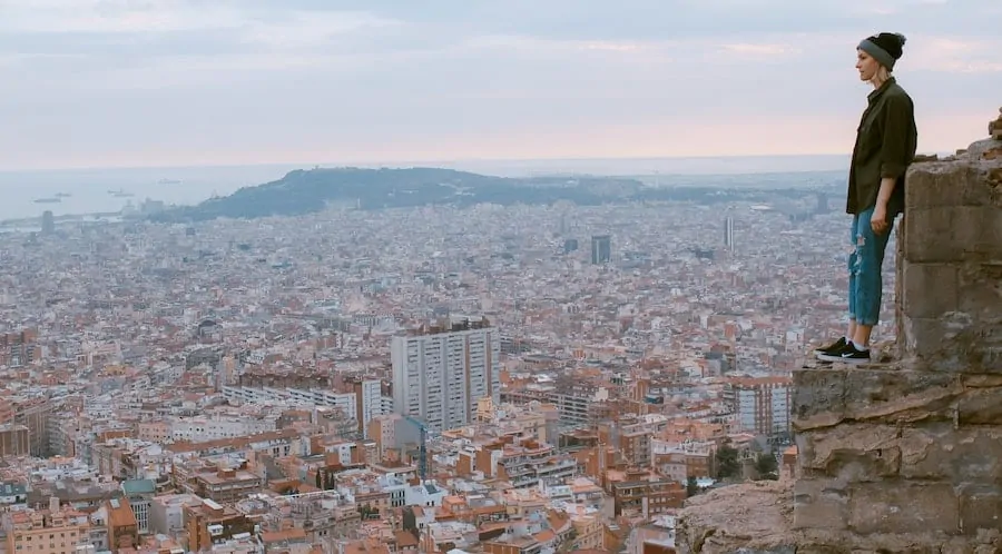 A Nomad Minimalist Overlooking a Large City