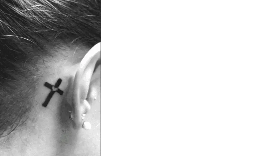 tattoo of cross behind ear