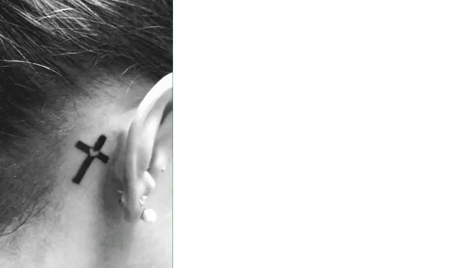 tattoo of cross behind ear